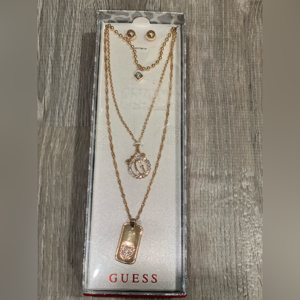 Guess earrings and necklaces